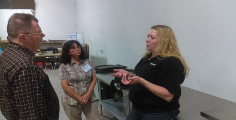Kelley Nicholson (right) of Autogrow Systems sharing knowledge